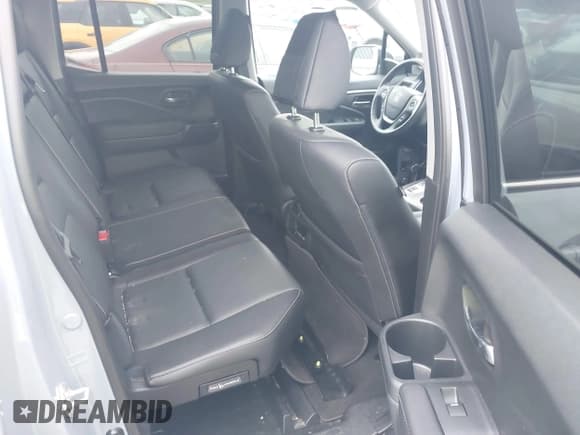 ✅ 2023 Honda Ridgeline RTL • VIN: 5FPYK3F5XPB067693 • Lot: 43179943. Listed on IAAI with 29,097 mi. Free auction sales archive from the USA and detailed vehicle history report at DreamBid. Image 8.