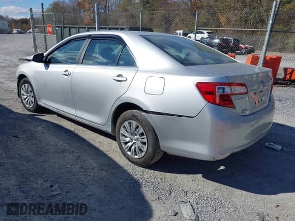 2012 Toyota Camry LE with VIN 4T1BF1FK7CU006571, listed as a IAAI auction lot 43580709 with 256,798 mi miles and . Bid and sale history available at DreamBid. Image 3.
