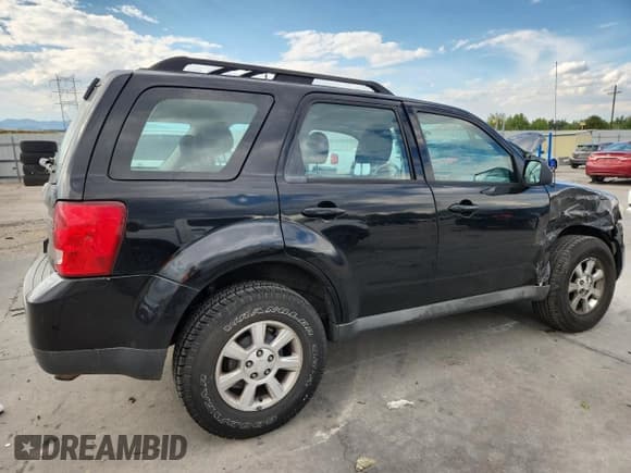 ✅ 2009 Mazda Tribute Sport • VIN: 4F2CZ02749KM07902 • Lot: 70761325. Listed on Copart with 291,448 mi. Free auction sales archive from the USA and detailed vehicle history report at DreamBid. Image 3.