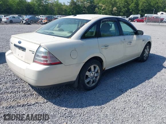 ✅ 2009 Ford Taurus Limited • VIN: 1FAHP28W69G115277 • Лот: 42410687. Опубликован ранее на IAAI с пробегом 217 796 миль. Бесплатный доступ к архиву аукционных продаж из США и подробный отчёт об истории автомобиля на DreamBid. Изображение 4.