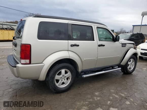 2008 Dodge Nitro SXT с VIN 1D8GT28K18W273997, выставлен на аукционе Copart как лот 82488214 с пробегом 185 077 миль миль и Списание • Salvage title. История ставок и продаж доступна на DreamBid. Изображение 3.