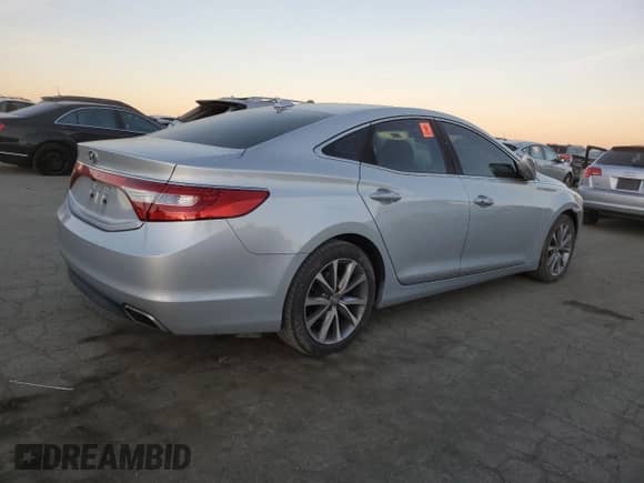 2016 Hyundai Azera z VIN KMHFG4JG4GA563397, wystawiony jako Copart lot #87879325 z przebiegiem 58 528 mil mil oraz Szkoda całkowita • Salvage title. Historia ofert i sprzedaży dostępna na DreamBid. Obrazek 3.