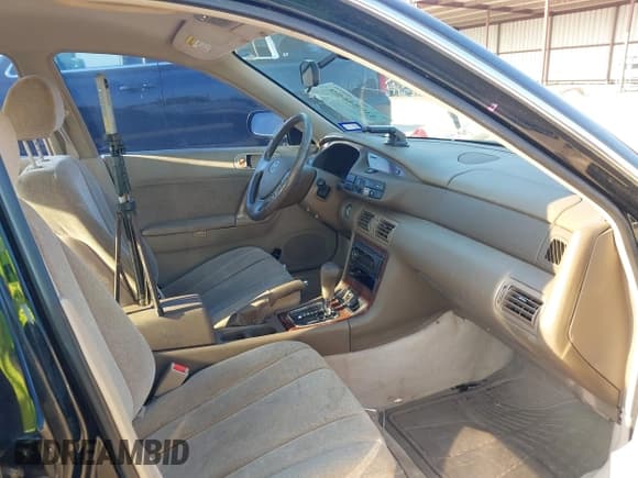 ✅ 1999 Mazda Millenia • VIN: JM1TA2217X1512130 • Lot: 43084659. Wystawiony na IAAI z przebiegiem 82 008 mil. Bezpłatny archiwum sprzedaży aukcyjnych z USA i szczegółowy raport historii pojazdu na DreamBid. Zdjęcie 5.