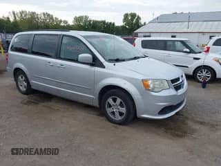 2012 Dodge Grand Caravan SXT z VIN 2C4RDGCG1CR197431, wystawiony jako IAAI lot #43273747 z przebiegiem 243 376 mil mil oraz . Historia ofert i sprzedaży dostępna na DreamBid. Obrazek 1.