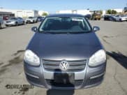 ✅ 2009 Volkswagen Jetta S • VIN: 3VWJZ71K49M151790 • Lot: 60104355. Listed on Copart with 99,476 mi. Free auction sales archive from the USA and detailed vehicle history report at DreamBid. Image 5.