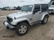 ✅ 2011 Jeep Wrangler Sahara • VIN: 1J4AA5D1XBL546236 • Lot: 64876485. Listed on Copart with 115,898 mi. Free auction sales archive from the USA and detailed vehicle history report at DreamBid. Image 1.