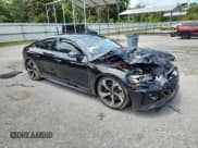 ✅ 2022 Audi RS 5 Sportback • VIN: WUAAWCF54NA902453 • Lot: 59820665. Listed on Copart with Not provided. Free auction sales archive from the USA and detailed vehicle history report at DreamBid. Image 4.