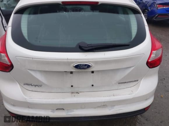 ✅ 2014 Ford Focus Titanium • VIN: 1FADP3N25EL375578 • Lot: 43863123. Listed on IAAI with 134,137 mi. Free auction sales archive from the USA and detailed vehicle history report at DreamBid. Image 6.