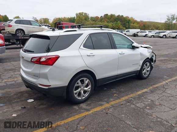 2019 Chevrolet Equinox LT with VIN 2GNAXVEX4K6267162, listed as a IAAI auction lot 43445786 with 73,104 mi miles and . Bid and sale history available at DreamBid. Image 4.