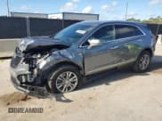 ✅ 2022 Cadillac XT5 FWD Premium Luxury • VIN: 1GYKNCRS2NZ113669 • Lot: 68668235. Wystawiony na Copart z przebiegiem 22 338 mil. Bezpłatny archiwum sprzedaży aukcyjnych z USA i szczegółowy raport historii pojazdu na DreamBid. Zdjęcie 1.