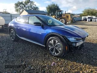 ✅ 2024 Kia EV6 Wind • VIN: KNDC34LA1R5211613 • Lot: 93514455. Wystawiony na Copart z przebiegiem 59 213 mil. Bezpłatny archiwum sprzedaży aukcyjnych z USA i szczegółowy raport historii pojazdu na DreamBid. Zdjęcie 4.