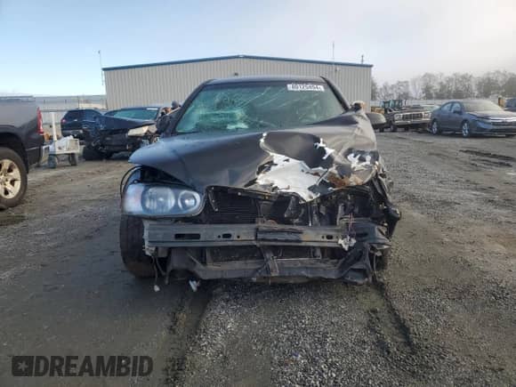 2002 Hyundai Elantra GT z VIN KMHDN55D92U046610, wystawiony jako Copart lot #80125494 z przebiegiem Nie podano mil oraz Szkoda całkowita • Salvage title. Historia ofert i sprzedaży dostępna na DreamBid. Obrazek 5.