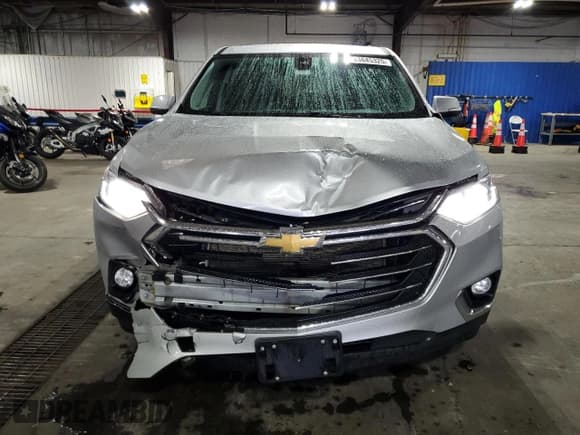 ✅ 2021 Chevrolet Traverse LT Cloth • VIN: 1GNEVGKW3MJ141153 • Lot: 83845325. Listed on Copart with 123,303 mi. Free auction sales archive from the USA and detailed vehicle history report at DreamBid. Image 5.