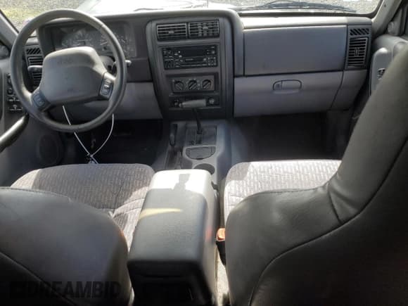 ✅ 1997 Jeep Cherokee Sport • VIN: 1J4FJ68S1VL558049 • Lot: 51627525. Listed on Copart with 196,918 mi. Free auction sales archive from the USA and detailed vehicle history report at DreamBid. Image 8.