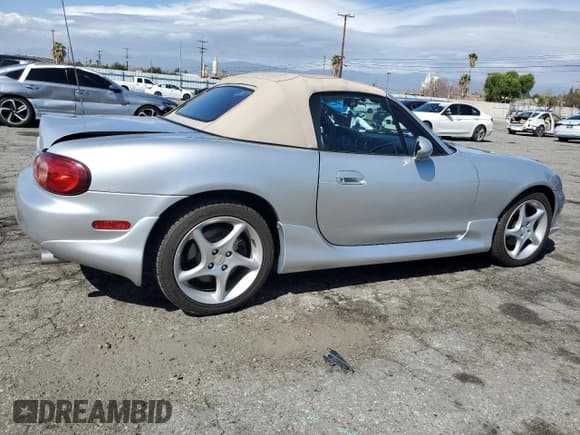 ✅ 2003 Mazda MX-5 Miata Cloth • VIN: JM1NB353430301685 • Lot: 48756715. Listed on Copart with 57,414 mi. Free auction sales archive from the USA and detailed vehicle history report at DreamBid. Image 3.