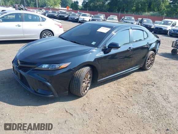 2023 Toyota Camry SE with VIN 4T1G11BKXPU097643, listed as a IAAI auction lot 42833306 with 23,580 mi miles and . Bid and sale history available at DreamBid. Image 18.