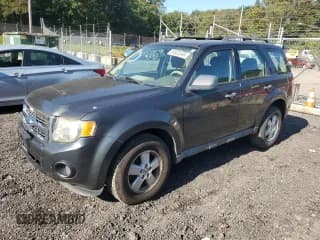 ✅ 2009 Ford Escape XLS • VIN: 1FMCU02789KC80906 • Lot: 84623545. Listed on Copart with 141,224 mi. Free auction sales archive from the USA and detailed vehicle history report at DreamBid. Image 1.
