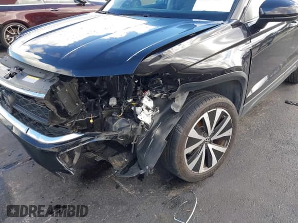 ✅ 2023 Volkswagen Taos SE • VIN: 3VVSX7B28PM372383 • Лот: 43403804. Опубликован ранее на IAAI с пробегом 22 415 миль. Бесплатный доступ к архиву аукционных продаж из США и подробный отчёт об истории автомобиля на DreamBid. Изображение 6.