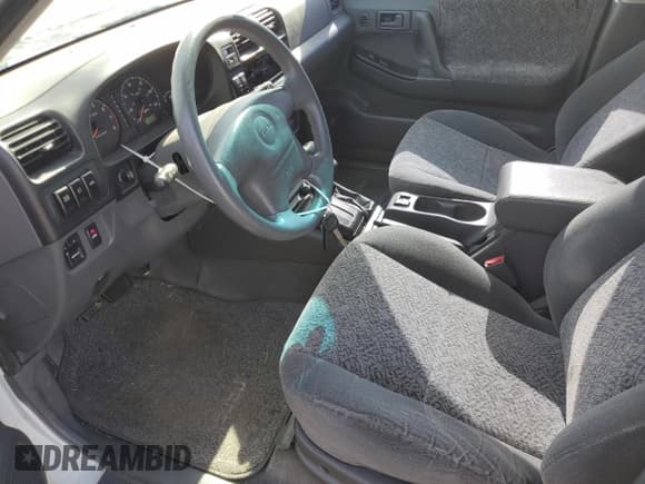 ✅ 2001 Isuzu Rodeo S • VIN: 4S2DM58W114343183 • Lot: 88128465. Wystawiony na Copart z przebiegiem 85 926 mil. Bezpłatny archiwum sprzedaży aukcyjnych z USA i szczegółowy raport historii pojazdu na DreamBid. Zdjęcie 7.