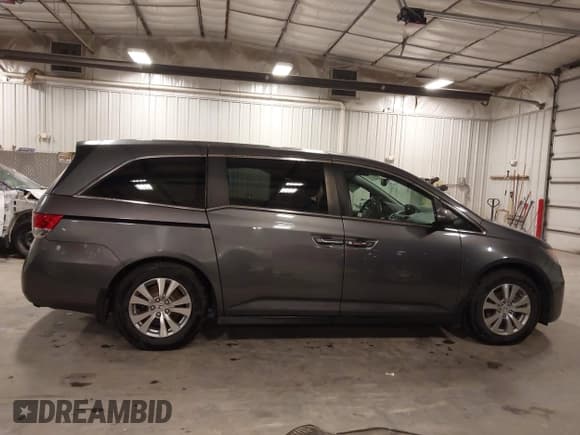 ✅ 2014 Honda Odyssey EX-L • VIN: 5FNRL5H60EB034923 • Lot: 43637432. Wystawiony na IAAI z przebiegiem 148 620 mil. Bezpłatny archiwum sprzedaży aukcyjnych z USA i szczegółowy raport historii pojazdu na DreamBid. Zdjęcie 13.