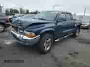 2004 Dodge Dakota SLT z VIN 1D7HG48N94S688652, wystawiony jako Copart lot #71942564 z przebiegiem 141 942 mil mil oraz Szkoda całkowita • Salvage title. Historia ofert i sprzedaży dostępna na DreamBid. Obrazek 1.