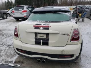 ✅ 2013 MINI Coupe S • VIN: WMWSX3C56DT772517 • Lot: 83702084. Listed on Copart with 106,910 mi. Free auction sales archive from the USA and detailed vehicle history report at DreamBid. Image 6.