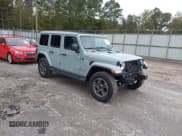 ✅ 2023 Jeep Wrangler Sahara • VIN: 1C4HJXEG5PW511502 • Lot: 43383510. Listed on IAAI with 24,169 mi. Free auction sales archive from the USA and detailed vehicle history report at DreamBid. Image 1.