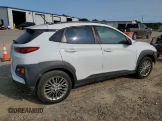 ✅ 2019 Hyundai Kona SEL • VIN: KM8K22AA4KU274735 • Лот: 70335574. Опубликован ранее на Copart с пробегом 100 696 миль. Бесплатный доступ к архиву аукционных продаж из США и подробный отчёт об истории автомобиля на DreamBid. Изображение 3.