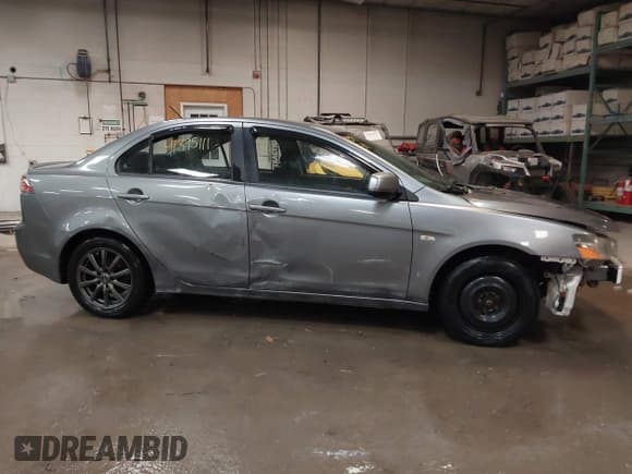 ✅ 2014 Mitsubishi Lancer SE • VIN: JA32V2FW6EU018244 • Lot: 41395111. Listed on IAAI with 160,169 mi. Free auction sales archive from the USA and detailed vehicle history report at DreamBid. Image 14.