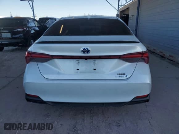 ✅ 2021 Toyota Avalon Hybrid XSE • VIN: 4T1EA1AB5MU010090 • Лот: 52791825. Опубликован ранее на Copart с пробегом 44 818 миль. Бесплатный доступ к архиву аукционных продаж из США и подробный отчёт об истории автомобиля на DreamBid. Изображение 6.