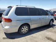 ✅ 2003 Honda Odyssey EX-L • VIN: 5FNRL18053B097209 • Lot: 69276205. Listed on Copart with 204,849 mi. Free auction sales archive from the USA and detailed vehicle history report at DreamBid. Image 3.