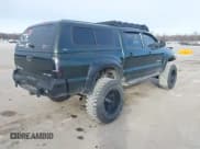 ✅ 2012 Toyota Tacoma • VIN: 3TMLU4EN8CM084941 • Lot: 41547330. Listed on IAAI with 118,460 mi. Free auction sales archive from the USA and detailed vehicle history report at DreamBid. Image 4.