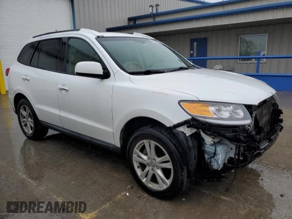 ✅ 2012 Hyundai Santa Fe Limited • VIN: 5XYZK4AG4CG158120 • Lot: 85439574. Listed on Copart with 100,830 mi. Free auction sales archive from the USA and detailed vehicle history report at DreamBid. Image 4.