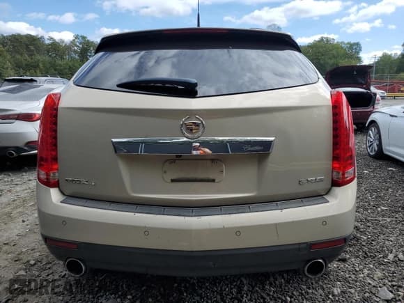 ✅ 2012 Cadillac SRX Premium Collection • VIN: 3GYFNFE37CS541202 • Лот: 85004865. Опубликован ранее на Copart с пробегом Не указан. Бесплатный доступ к архиву аукционных продаж из США и подробный отчёт об истории автомобиля на DreamBid. Изображение 6.