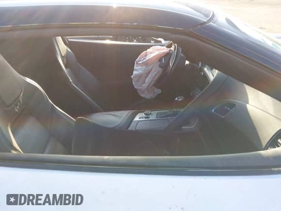 2015 Chevrolet Corvette 2LT с VIN 1G1YD2D7XF5100850, выставлен на аукционе IAAI как лот 43275718 с пробегом Не указан миль и . История ставок и продаж доступна на DreamBid. Изображение 5.