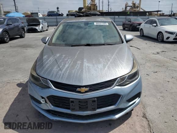 ✅ 2018 Chevrolet Cruze LT • VIN: 1G1BE5SM2J7114834 • Lot: 80557205. Listed on Copart with 131,256 mi. Free auction sales archive from the USA and detailed vehicle history report at DreamBid. Image 5.
