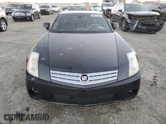 ✅ 2004 Cadillac XLR • VIN: 1G6YV34A445602565 • Лот: 84011204. Опубликован ранее на Copart с пробегом Не указан. Бесплатный доступ к архиву аукционных продаж из США и подробный отчёт об истории автомобиля на DreamBid. Изображение 5.