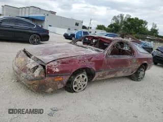 ✅ 1988 Dodge Daytona • VIN: 1B3CA44K0JG328039 • Lot: 80915124. Listed on Copart with Not provided. Free auction sales archive from the USA and detailed vehicle history report at DreamBid. Image 1.