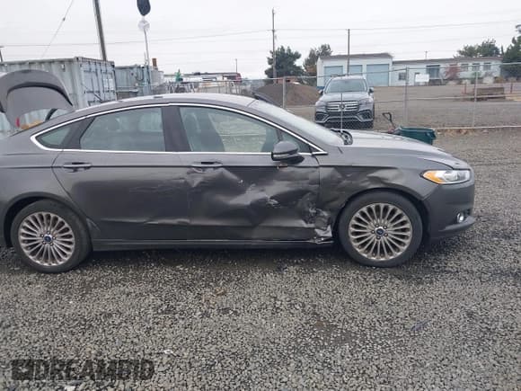 ✅ 2016 Ford Fusion Titanium • VIN: 3FA6P0K91GR248968 • Лот: 43181413. Опубликован ранее на IAAI с пробегом 126 692 миль. Бесплатный доступ к архиву аукционных продаж из США и подробный отчёт об истории автомобиля на DreamBid. Изображение 6.