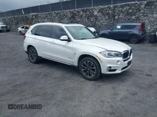 ✅ 2018 BMW X5 xDrive40e • VIN: 5UXKT0C57J0W01915 • Lot: 42270505. Listed on IAAI with 45,895 mi. Free auction sales archive from the USA and detailed vehicle history report at DreamBid. Image 1.