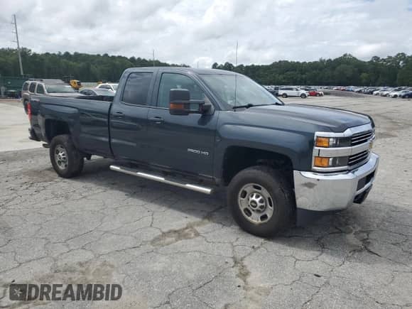2017 Chevrolet Silverado 2500HD Work Truck with VIN 1GC2KUEG4HZ365658, listed as a Copart auction lot 68069045 with 233,573 mi miles and Salvage title. Bid and sale history available at DreamBid. Image 4.