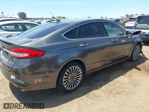✅ 2018 Ford Fusion Titanium • VIN: 3FA6P0SU9JR150413 • Лот: 42830416. Опубликован ранее на IAAI с пробегом 60 895 миль. Бесплатный доступ к архиву аукционных продаж из США и подробный отчёт об истории автомобиля на DreamBid. Изображение 4.