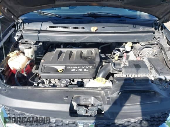 2015 Dodge Journey American Value z VIN 3C4PDCAB1FT637818, wystawiony jako IAAI lot #43497822 z przebiegiem 164 458 mil mil oraz . Historia ofert i sprzedaży dostępna na DreamBid. Obrazek 10.