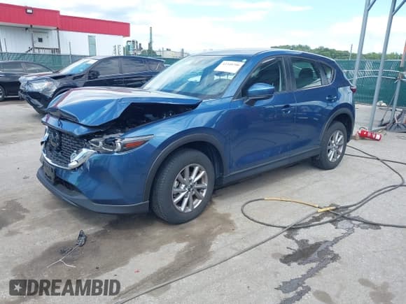 ✅ 2023 Mazda CX-5 S • VIN: JM3KFBAM2P0126351 • Lot: 42340700. Listed on IAAI with 11,995 mi. Free auction sales archive from the USA and detailed vehicle history report at DreamBid. Image 2.
