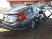 ✅ 2017 Honda Civic LX • VIN: 19XFC2F54HE041105 • Lot: 43595218. Listed on IAAI with 124,866 mi. Free auction sales archive from the USA and detailed vehicle history report at DreamBid. Image 4.