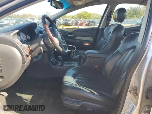 ✅ 2001 Chrysler 300M M • VIN: 2C3AE66GX1H699202 • Lot: 89663205. Wystawiony na Copart z przebiegiem 190 555 mil. Bezpłatny archiwum sprzedaży aukcyjnych z USA i szczegółowy raport historii pojazdu na DreamBid. Zdjęcie 7.