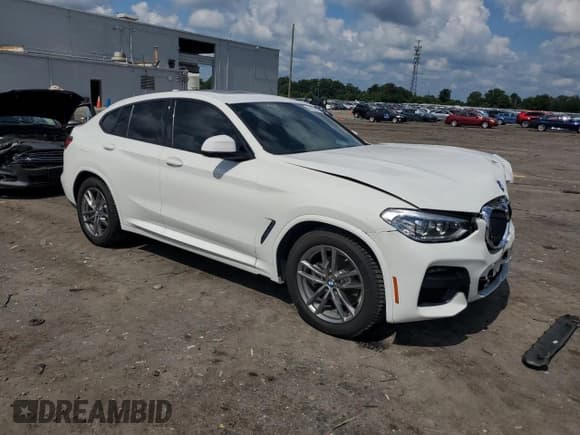 ✅ 2020 BMW X4 xDrive30i • VIN: 5UX2V1C0XL9D06622 • Lot: 64495785. Listed on Copart with 98,338 mi. Free auction sales archive from the USA and detailed vehicle history report at DreamBid. Image 4.