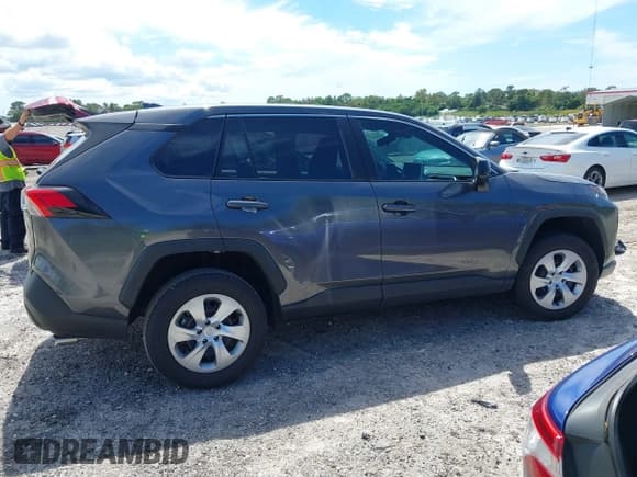 ✅ 2023 Toyota RAV4 LE • VIN: 2T3H1RFV3PC239055 • Lot: 43266107. Listed on IAAI with 19,713 mi. Free auction sales archive from the USA and detailed vehicle history report at DreamBid. Image 13.