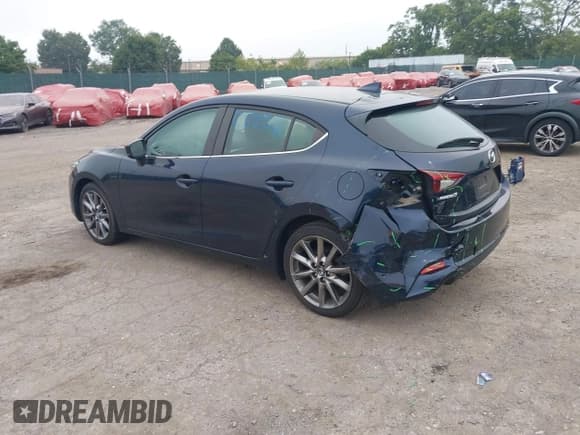 ✅ 2018 Mazda 3 Touring • VIN: 3MZBN1L32JM163007 • Lot: 42971840. Wystawiony na IAAI z przebiegiem 93 319 mil. Bezpłatny archiwum sprzedaży aukcyjnych z USA i szczegółowy raport historii pojazdu na DreamBid. Zdjęcie 3.