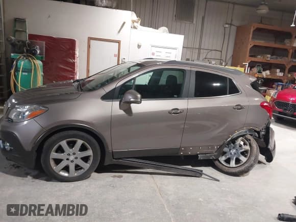 ✅ 2014 Buick Encore Leather • VIN: KL4CJCSB4EB616185 • Lot: 43475166. Listed on IAAI with 139,094 mi. Free auction sales archive from the USA and detailed vehicle history report at DreamBid. Image 14.